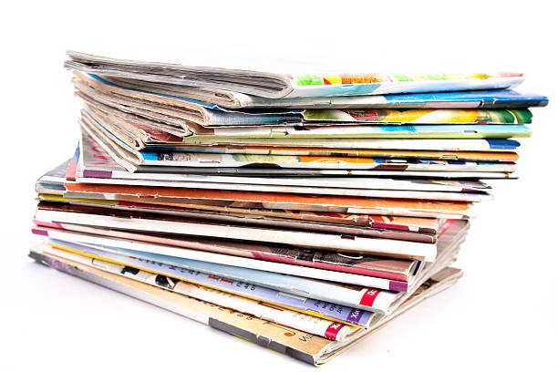 stack of magazines isolated on white background